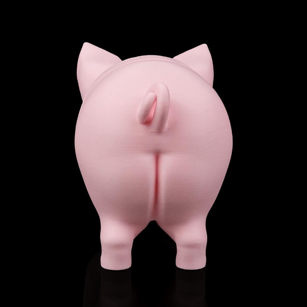 Pork Chop pig from behind, with its curly tail