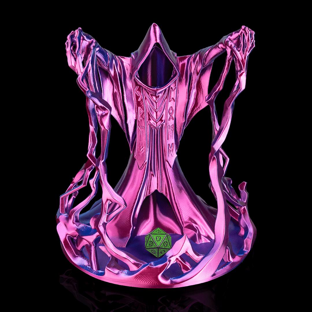Wizard dice tower in pink and purple silk from the front, a green d20 at its feet