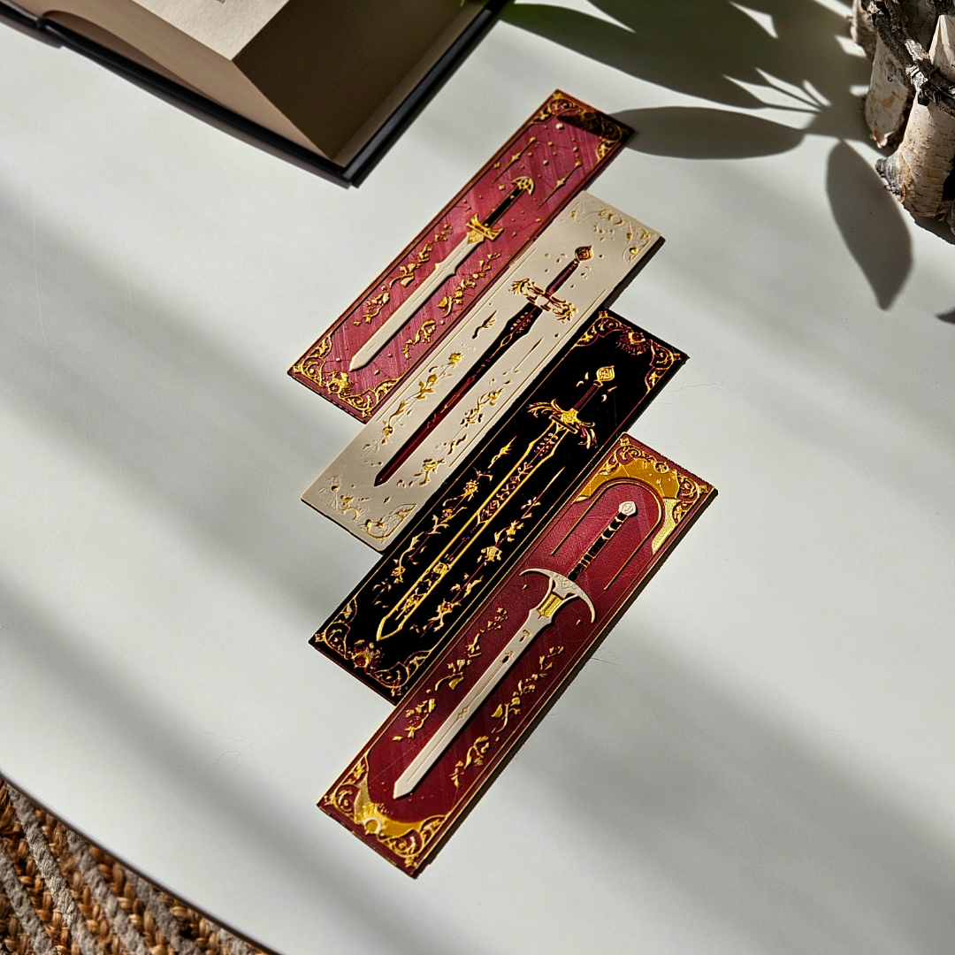 Decorative bookends with intricate designs on a light surface