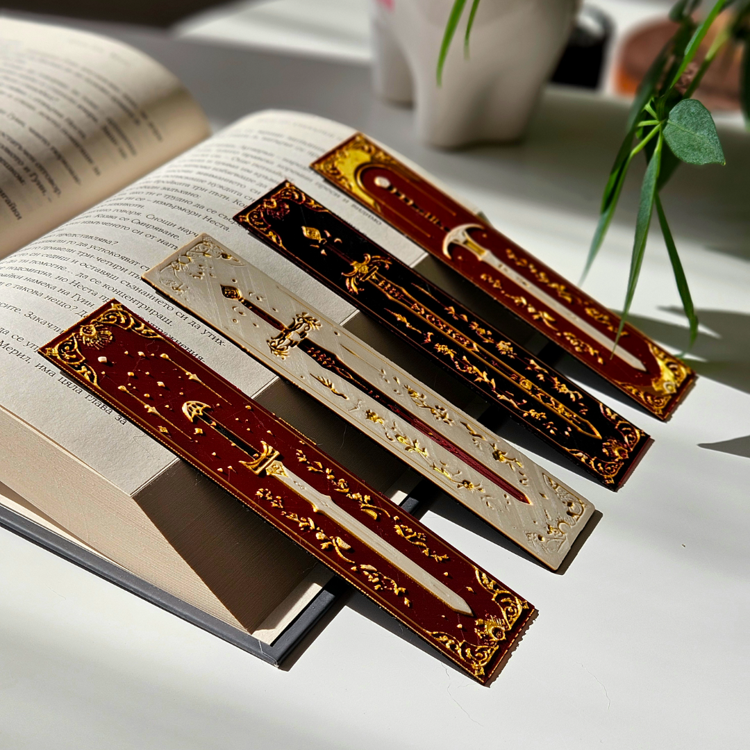 Decorative bookmarks with gold patterns on an open book
