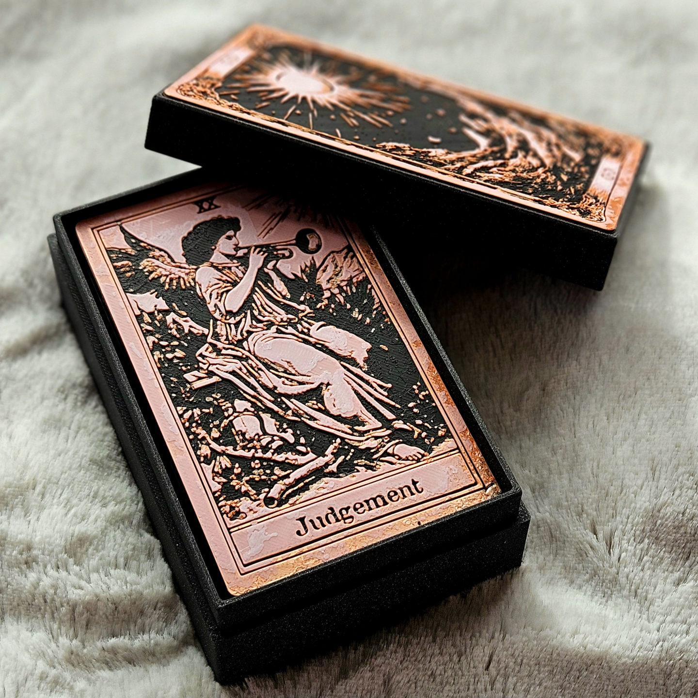 Tarot card with 'Judgement' card design on a textured surface