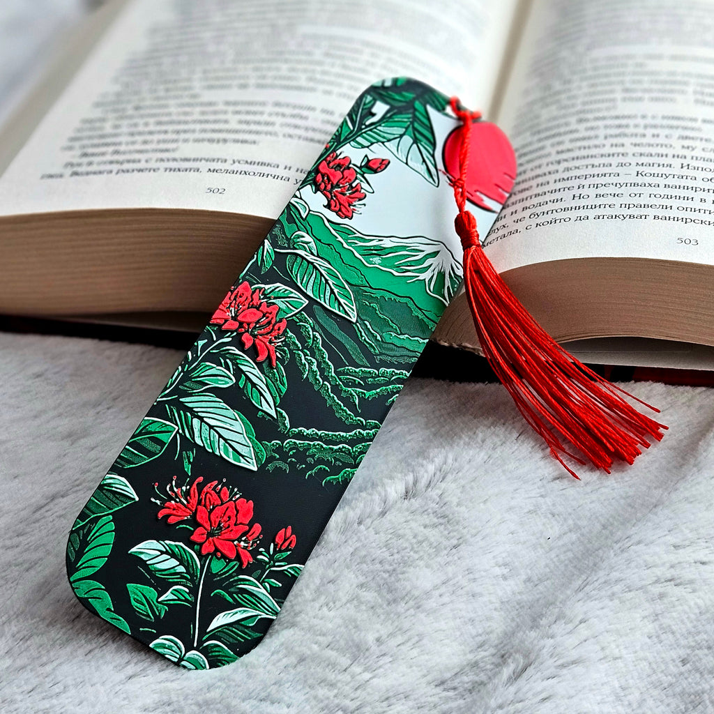 Floral bookmark with a red tassel on an open book