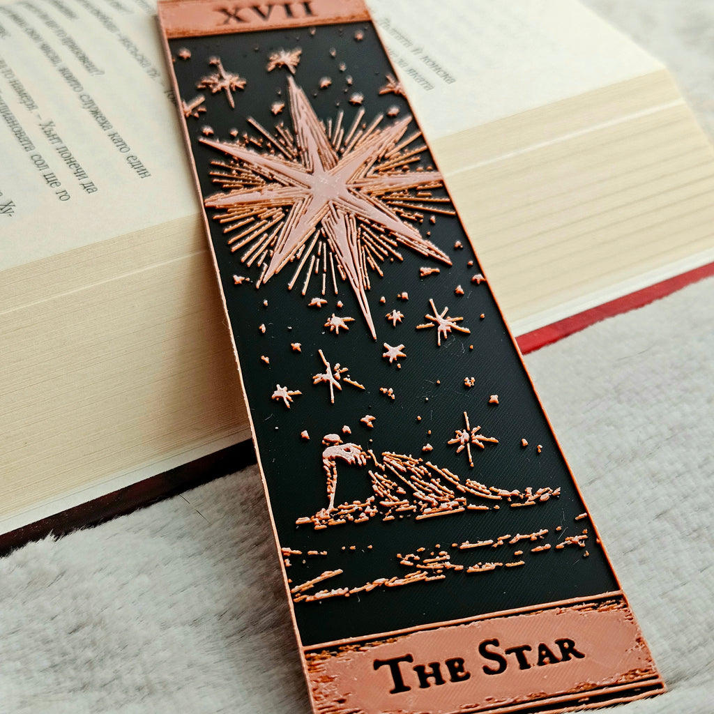 Decorative bookmark with star design on an open book