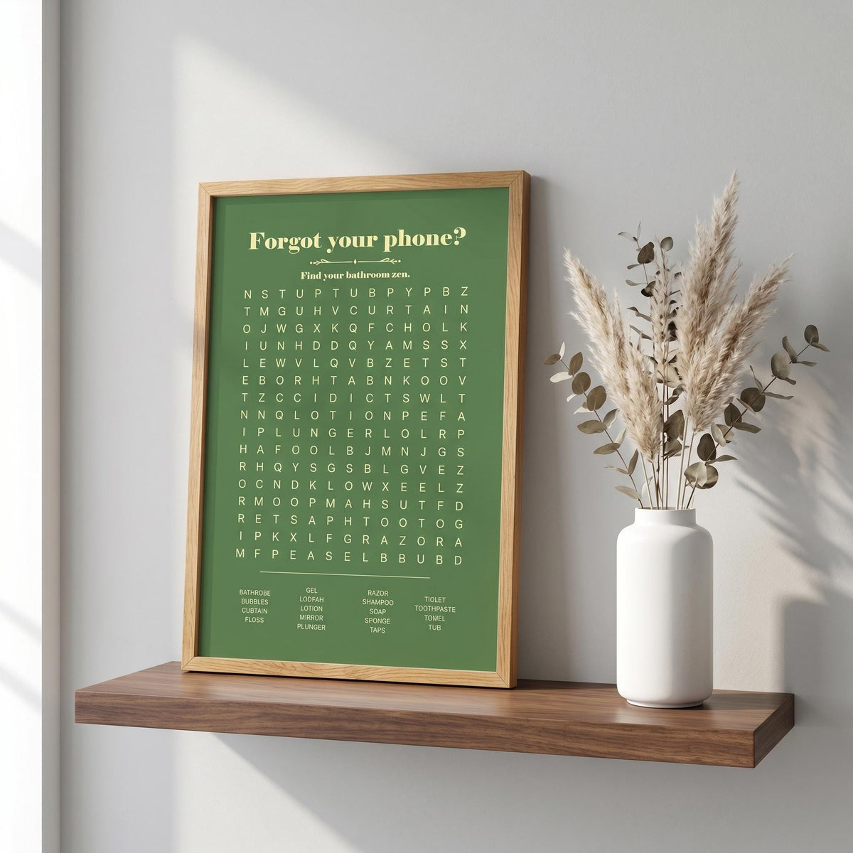 Forest green bathroom word search print in a wood frame