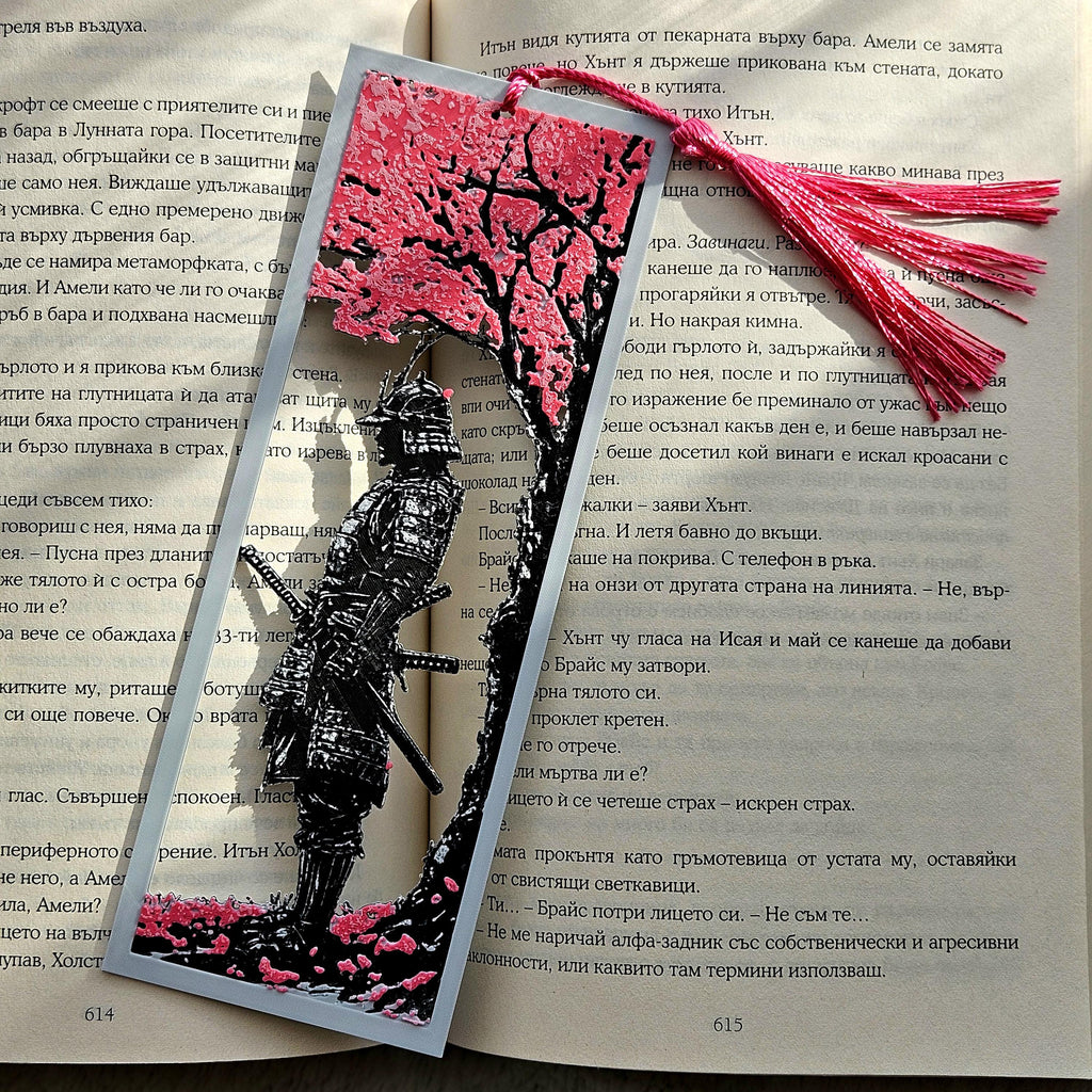 Decorative bookmark with tassel on an open book