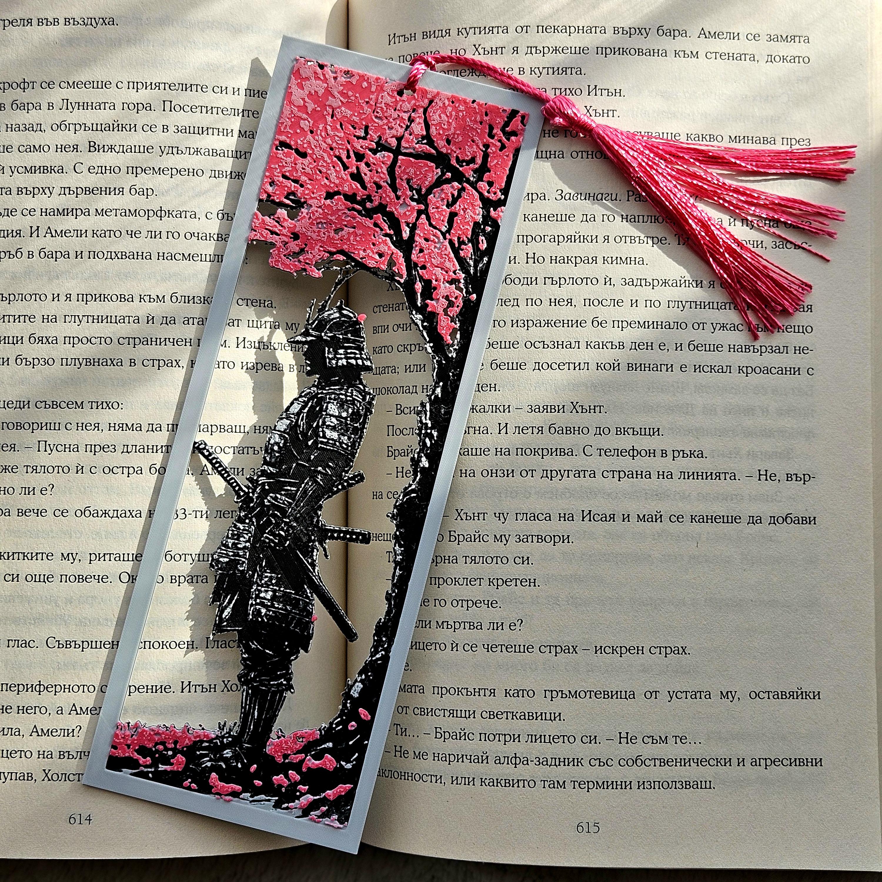 Decorative bookmark with tassel on an open book