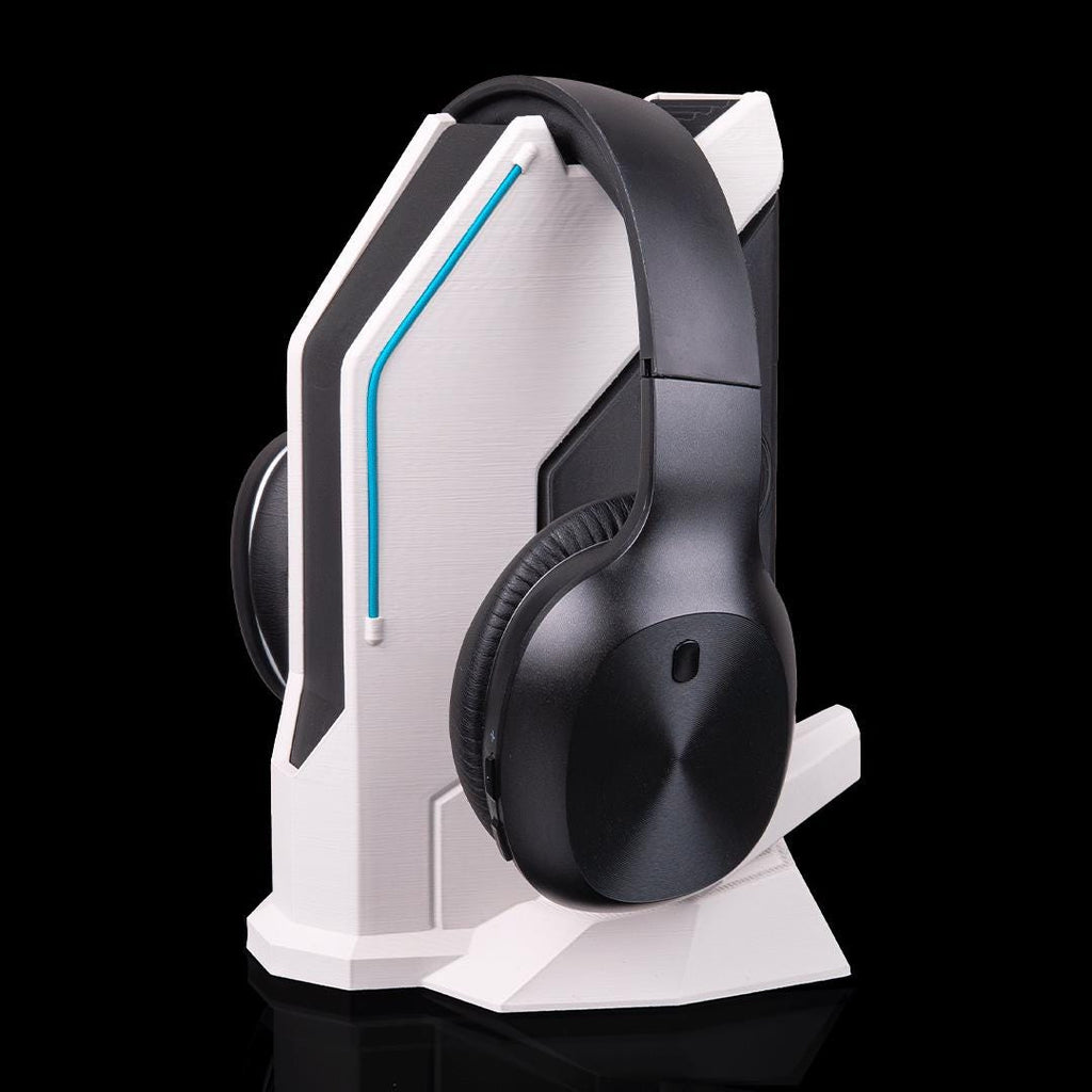 Sci-fi headset stand with black headphones, from an angle