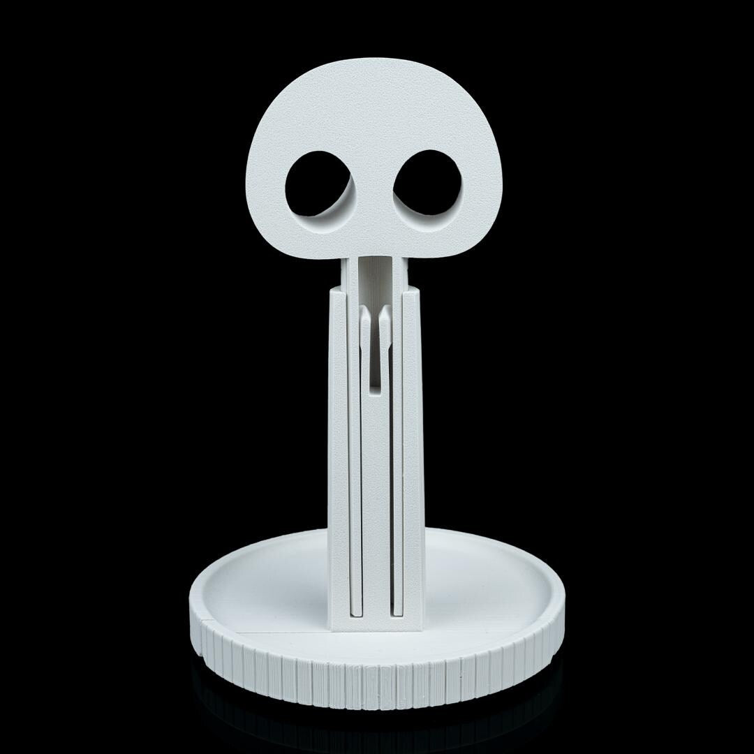 White skull headphone stand from the back
