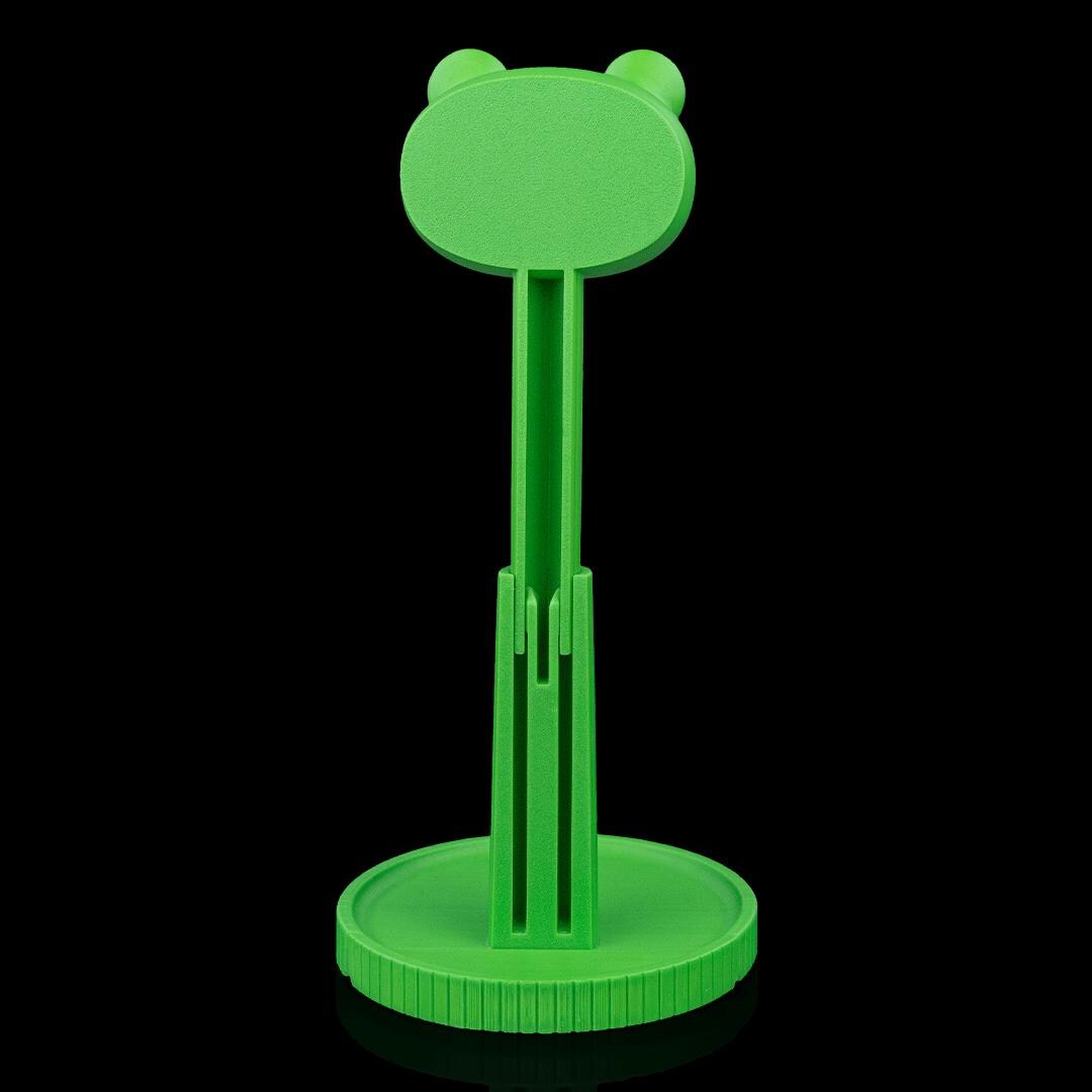 Green frog headphone stand from behind