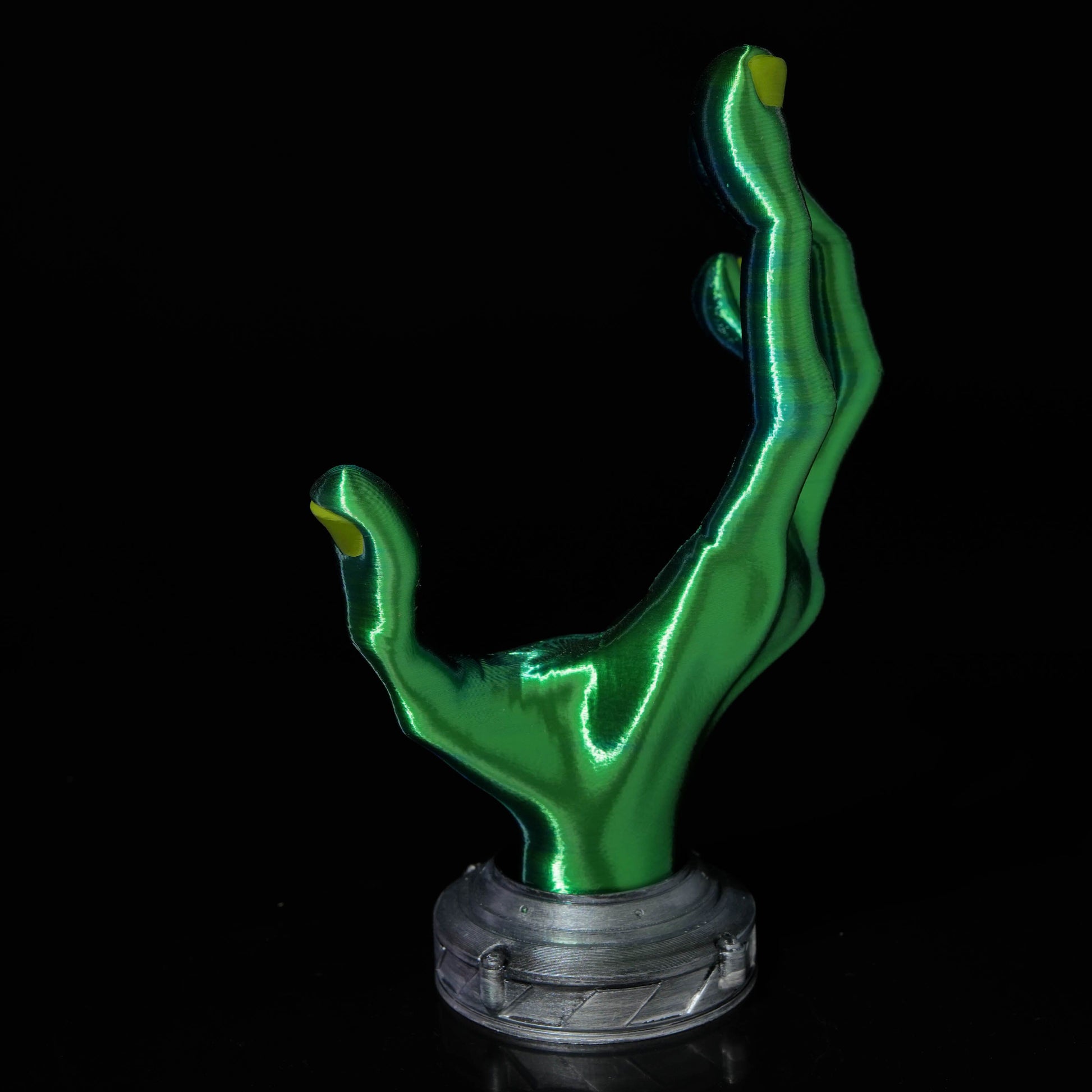 Alien Hand Controller Holder from multiple angles showcasing its unique design as sci-fi decor.