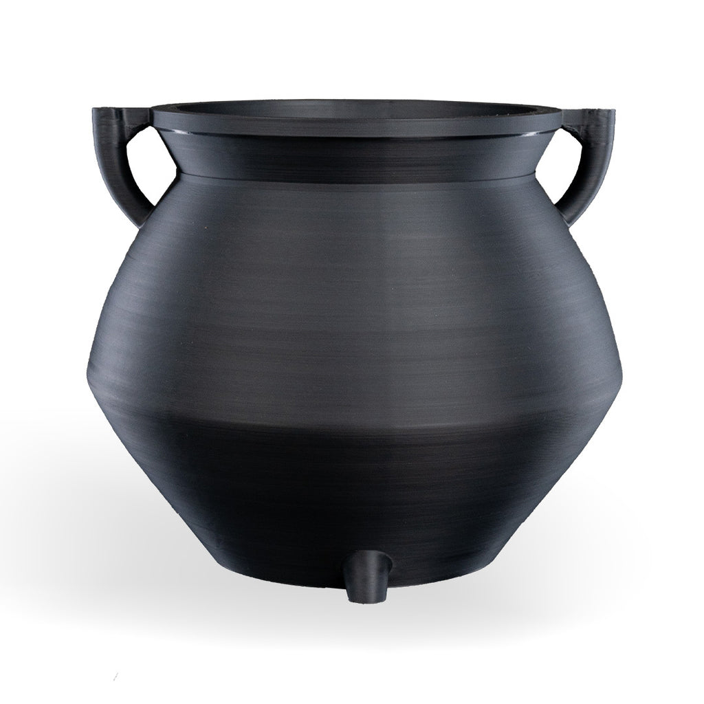 Close-up of the spooky cauldron candy bowl with a bubbling effect