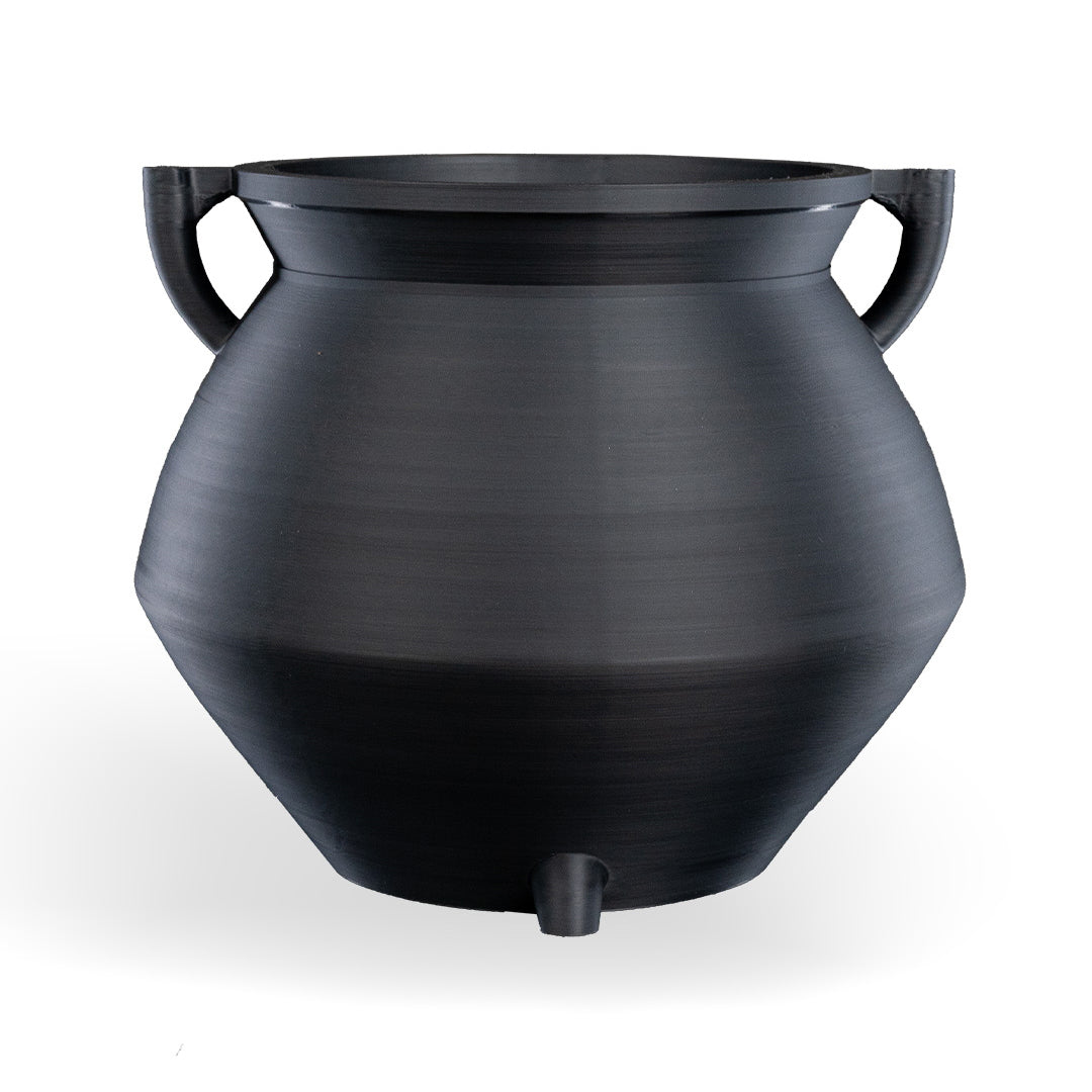 Close-up of the spooky cauldron candy bowl with a bubbling effect
