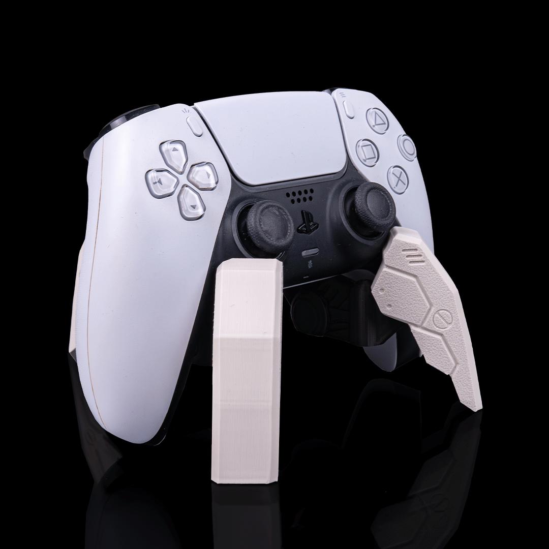 Robot spider stand holding a PS5 controller from an angle