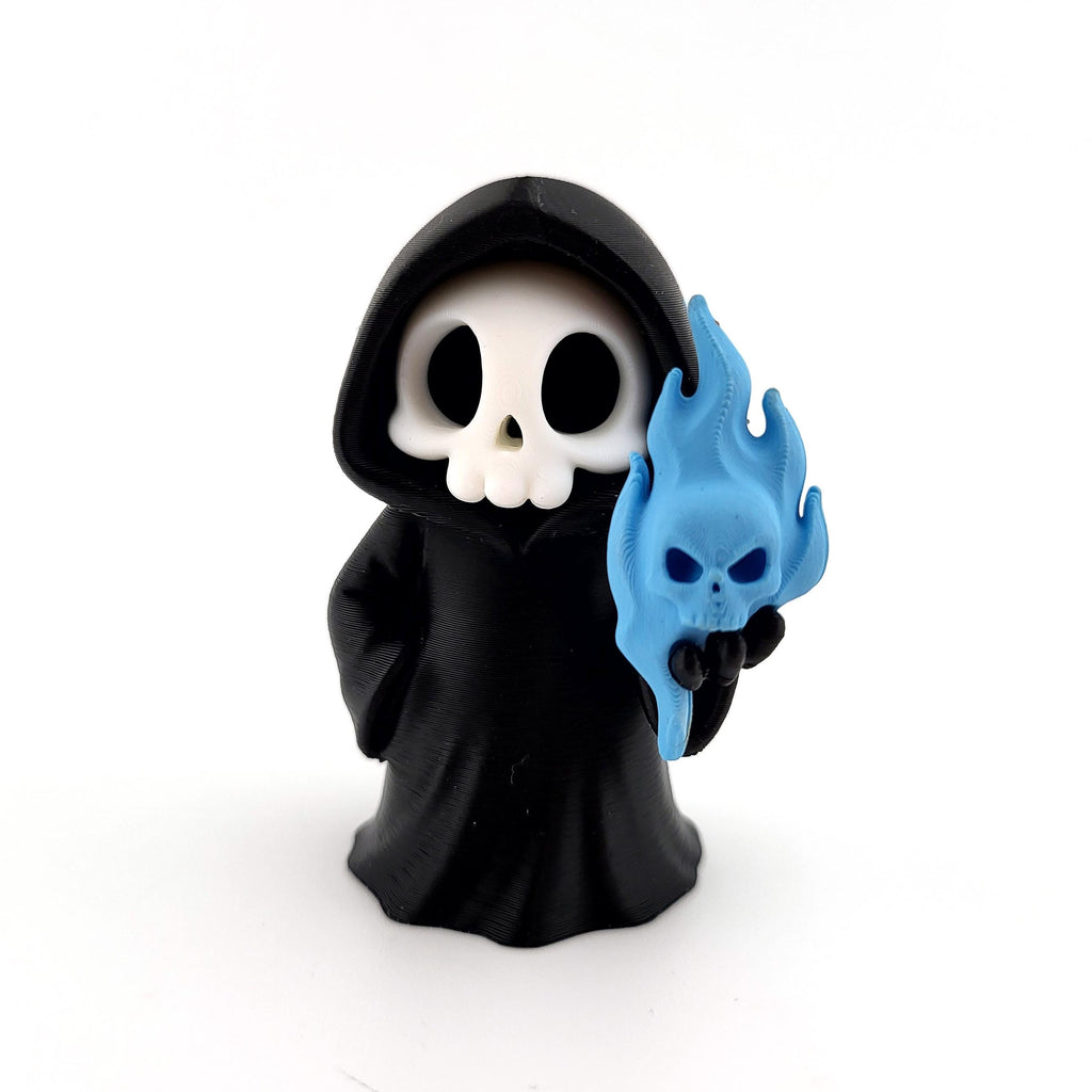 The Guardian of Flame grim reaper holding a blue flaming skull
