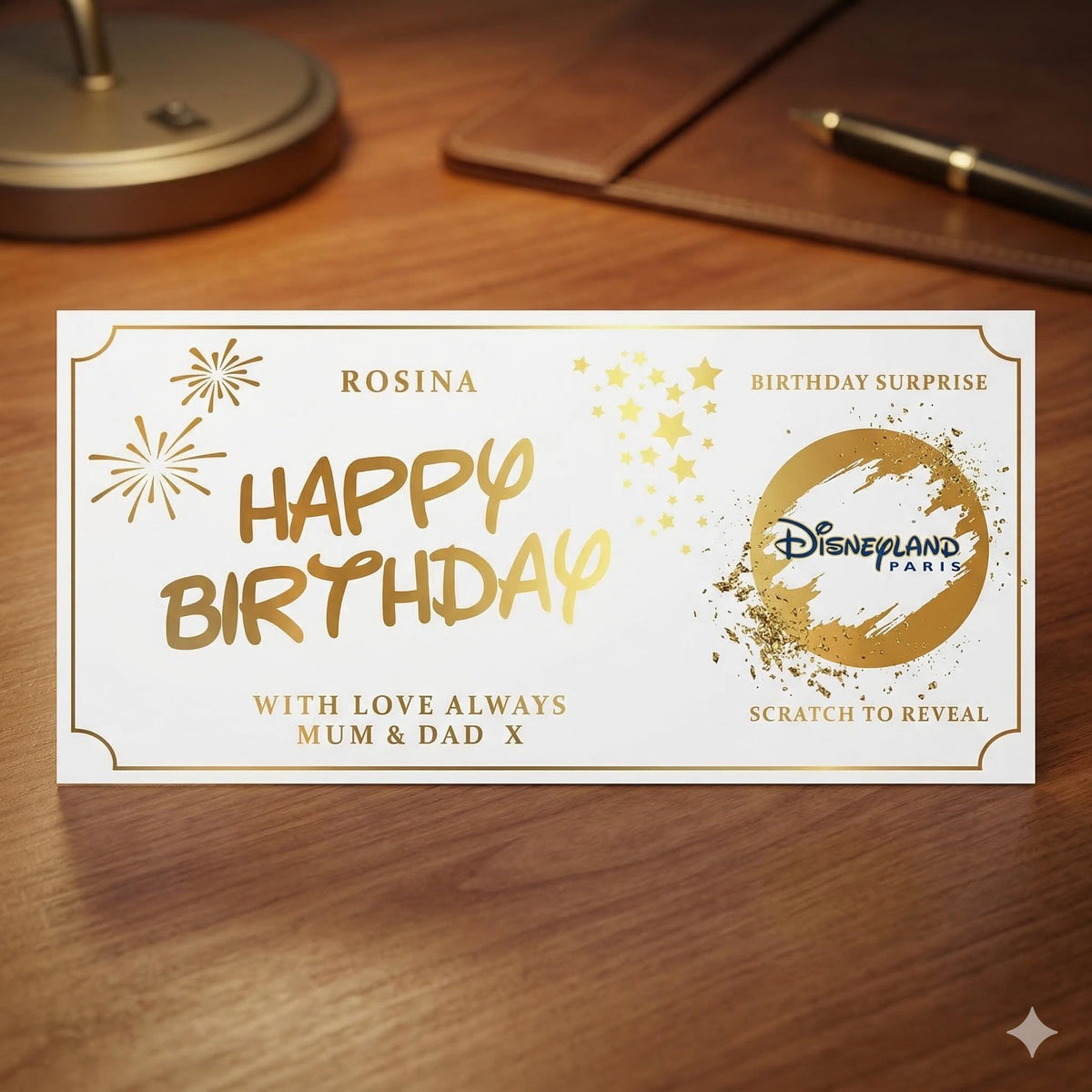 Birthday scratch card with the panel scratched away to reveal a holiday surprise