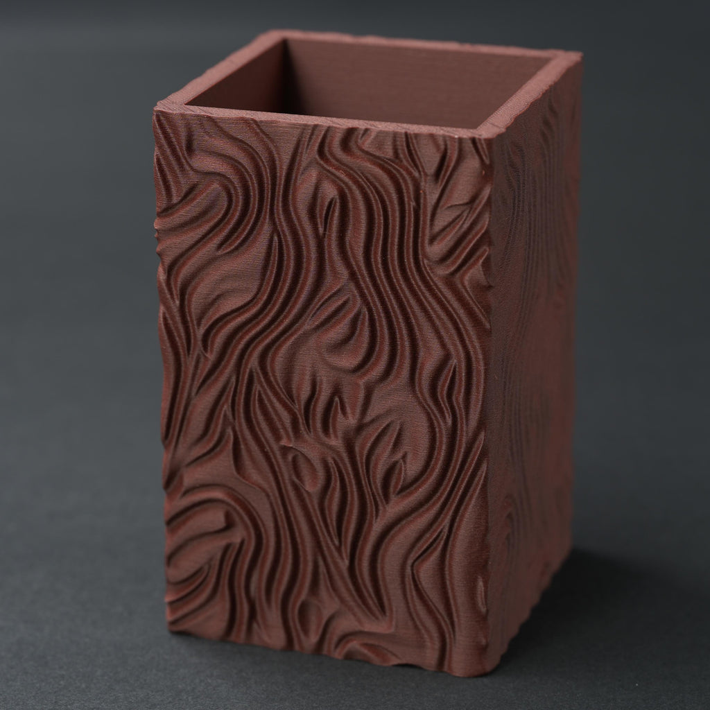 Terracotta pencil holder from an angle