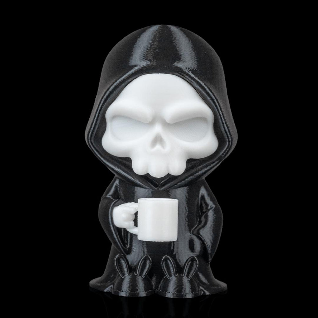 Coffin Break grim reaper figure with a white mug and black slippers