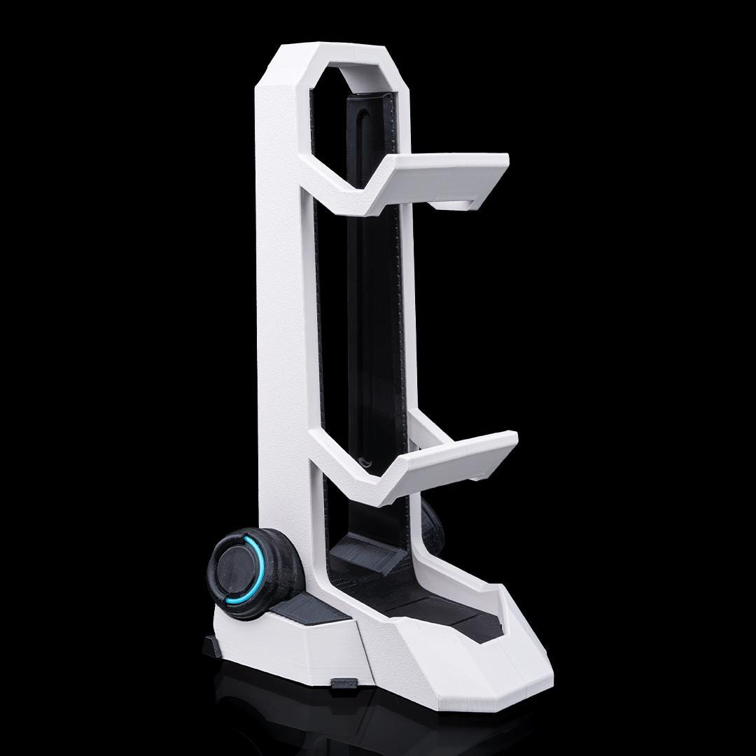 Empty dual controller stand from an angle, showing both cradles