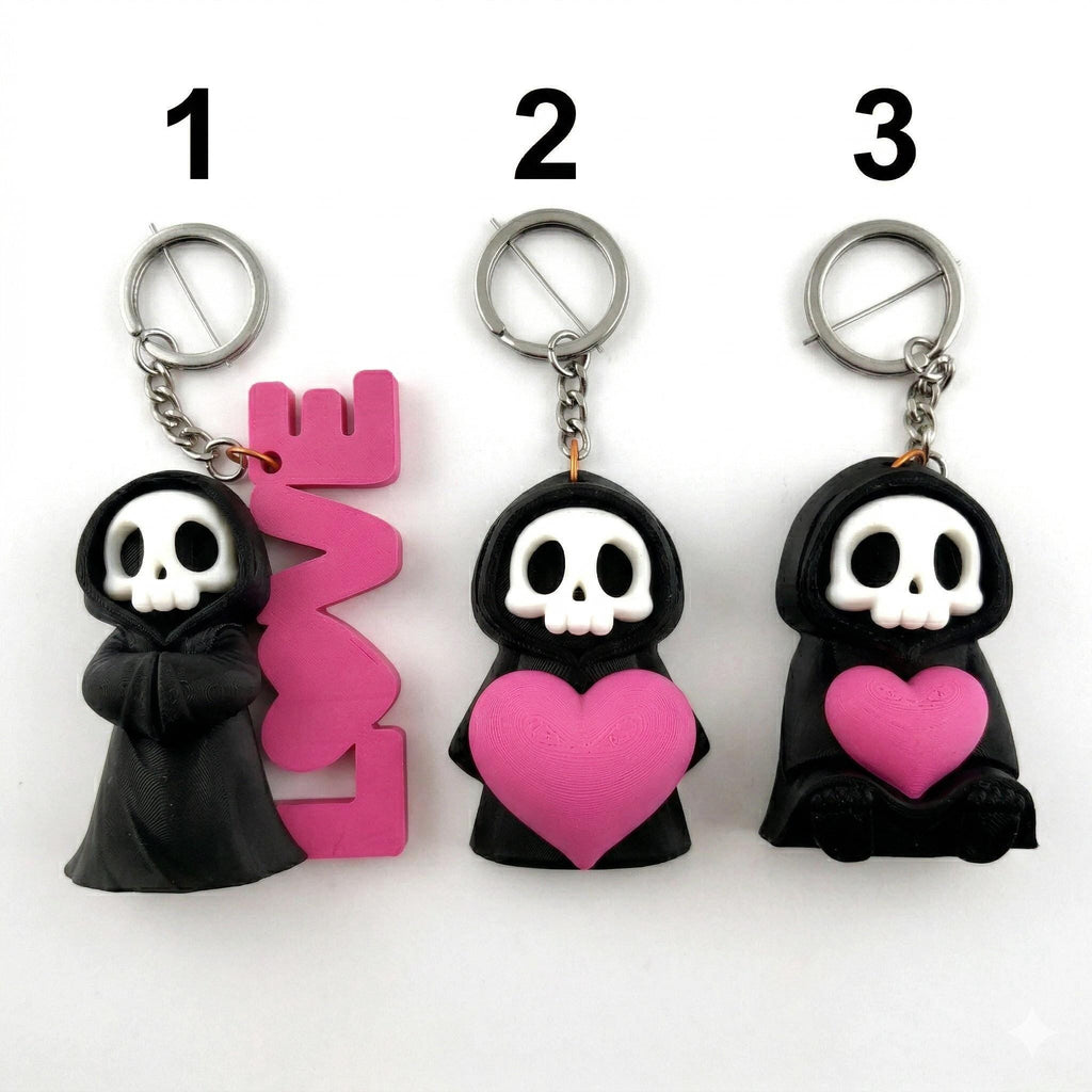 The three Love Reaper keyrings, numbered 1 to 3