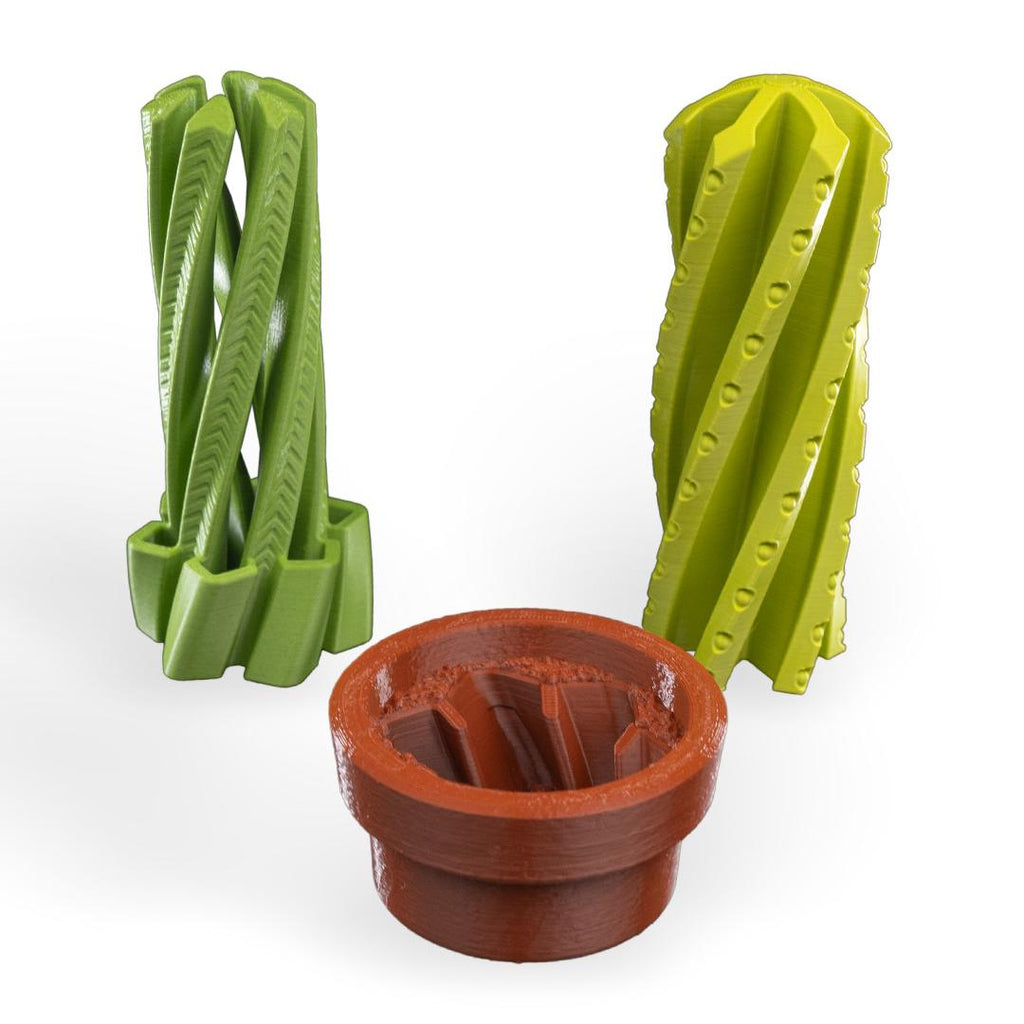 Green plastic tools with a brown container on a white background