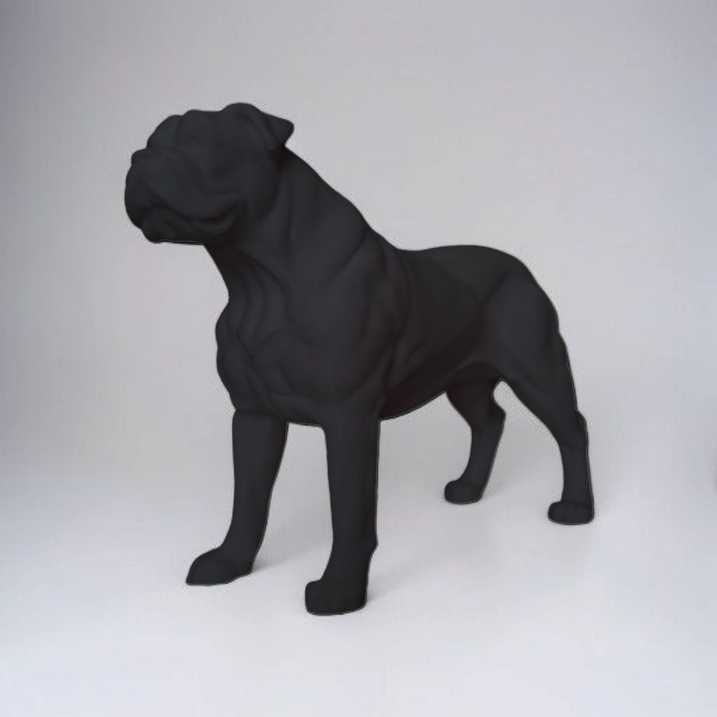 Black dog sculpture on a white background