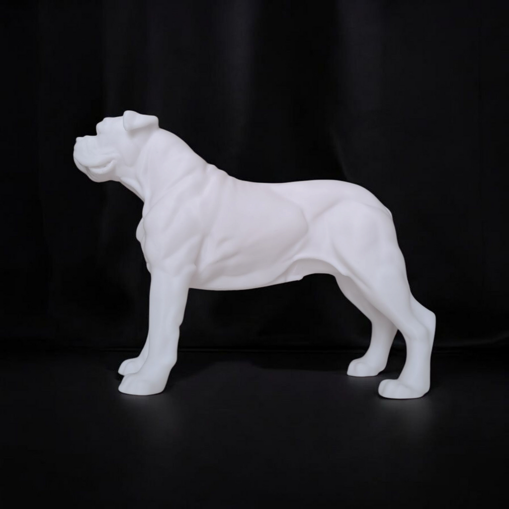 White dog statue on a black background