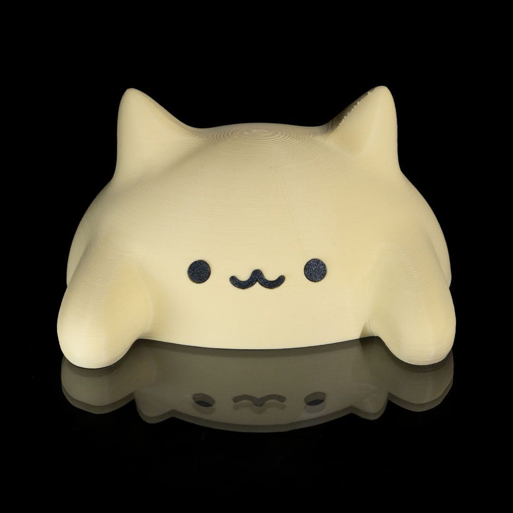 Cat-shaped night light with a black background