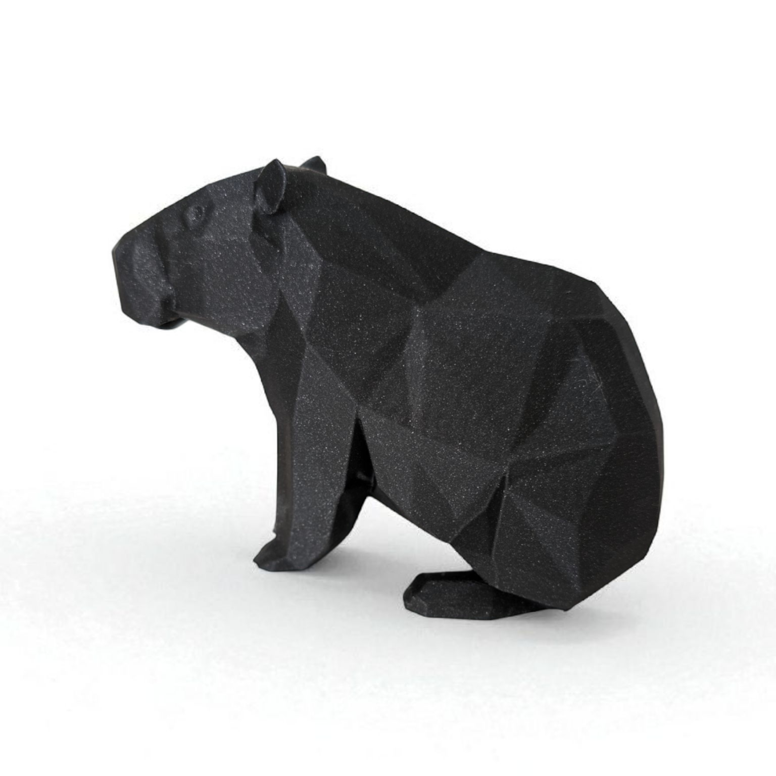 A modern living room shelf featuring the capybara figure as a decor accent.