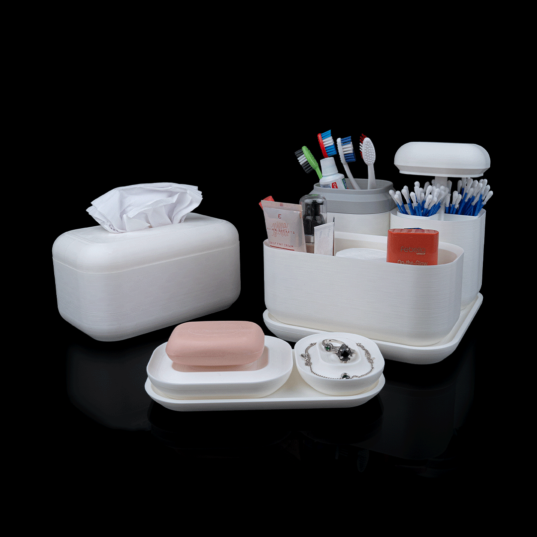 White bathroom organizer with various items including a tissue box, soap, and toothbrush holder on a black background.