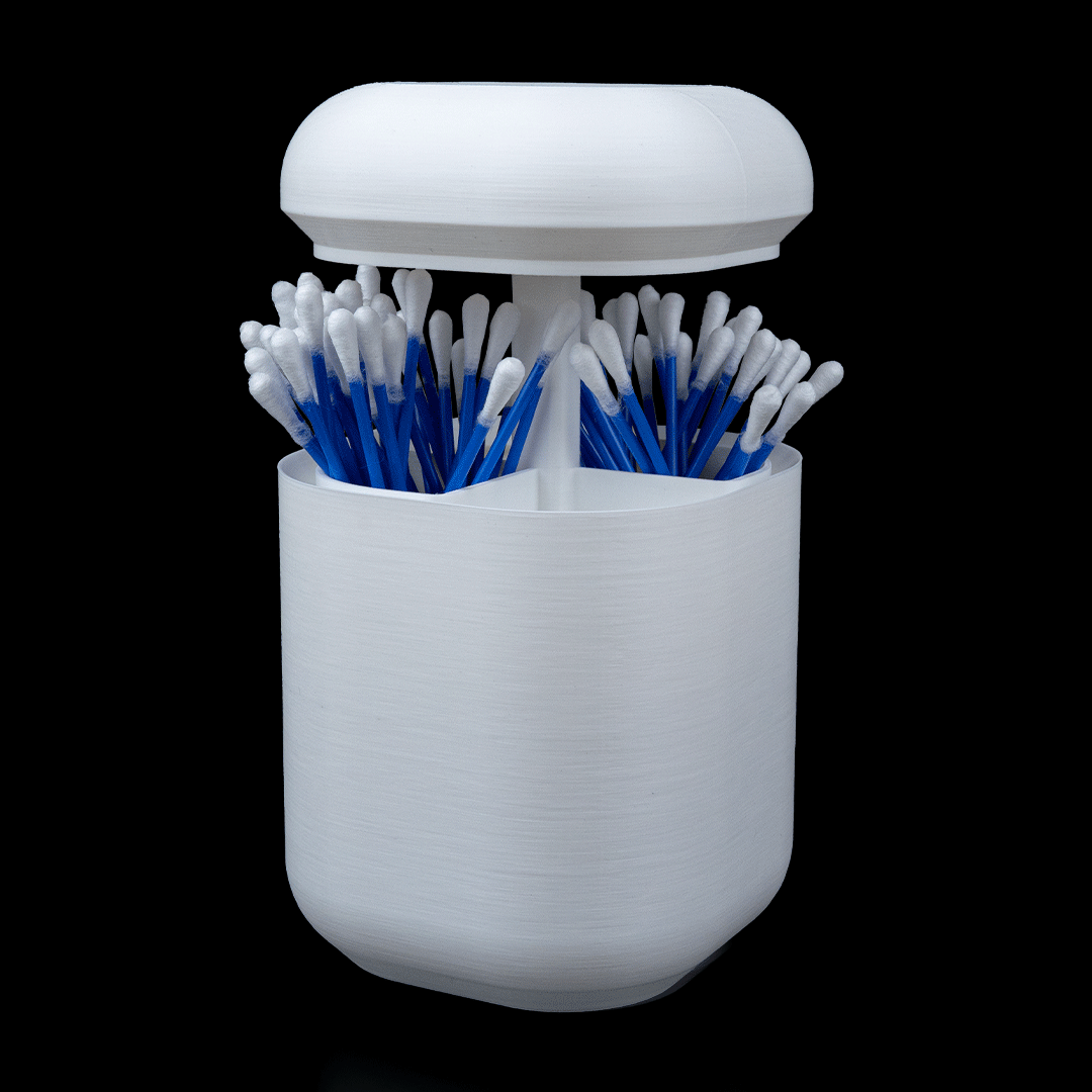 White container with blue and white cotton swabs on a black background