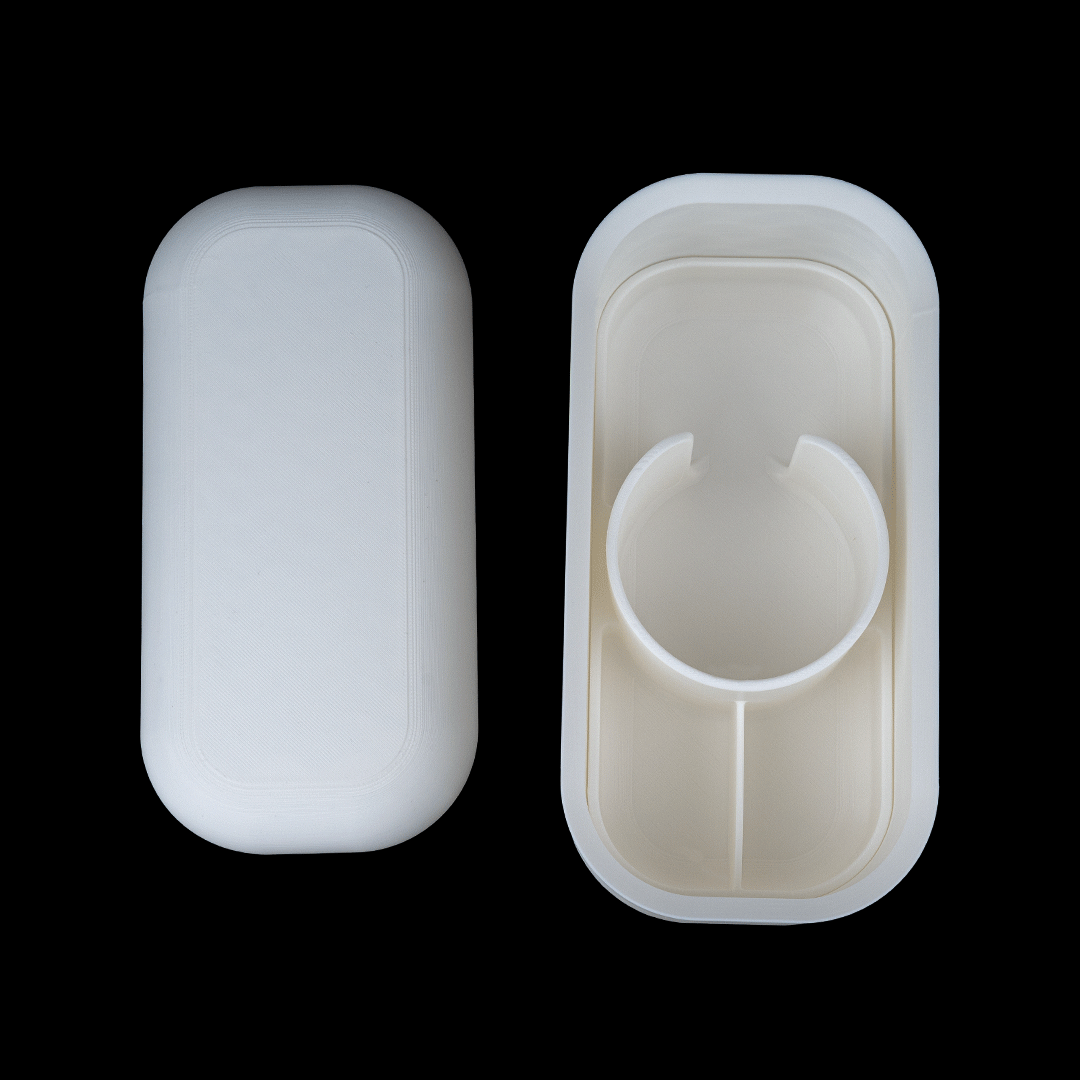 White plastic container with a lid on a black background