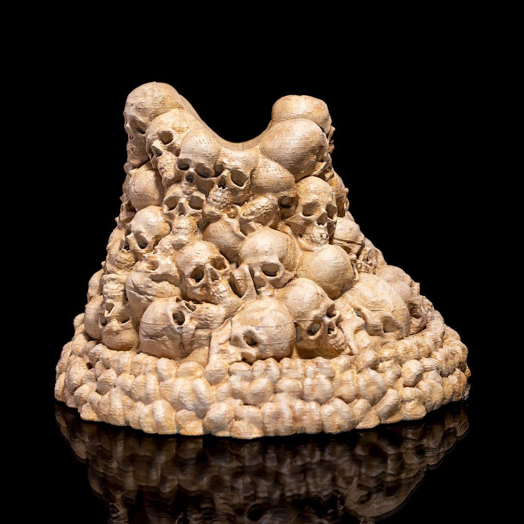 Close up of detailed skulls on Fate of the Fallen controller stand - grim fantasy decor