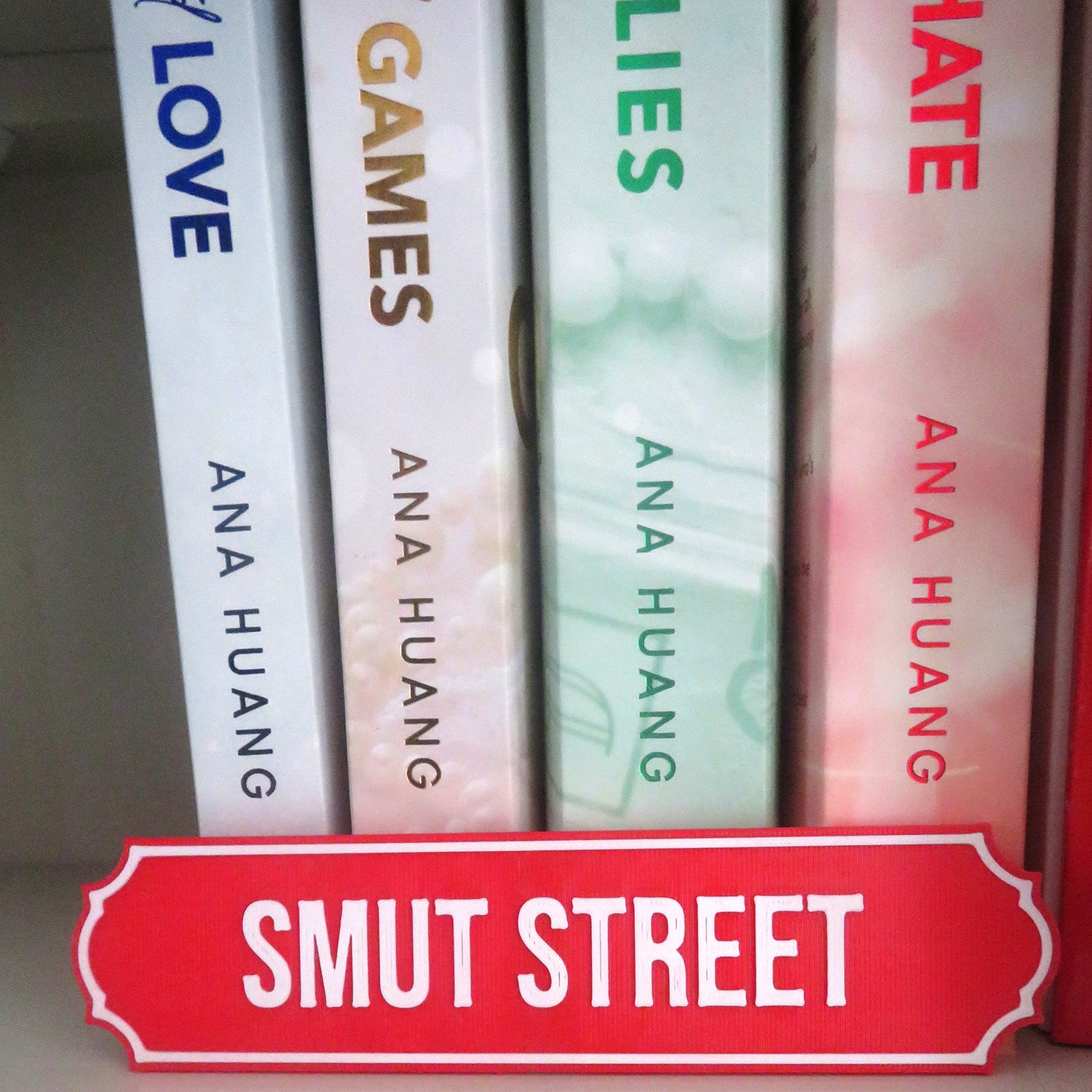 Smut St Bookshelf Street Sign