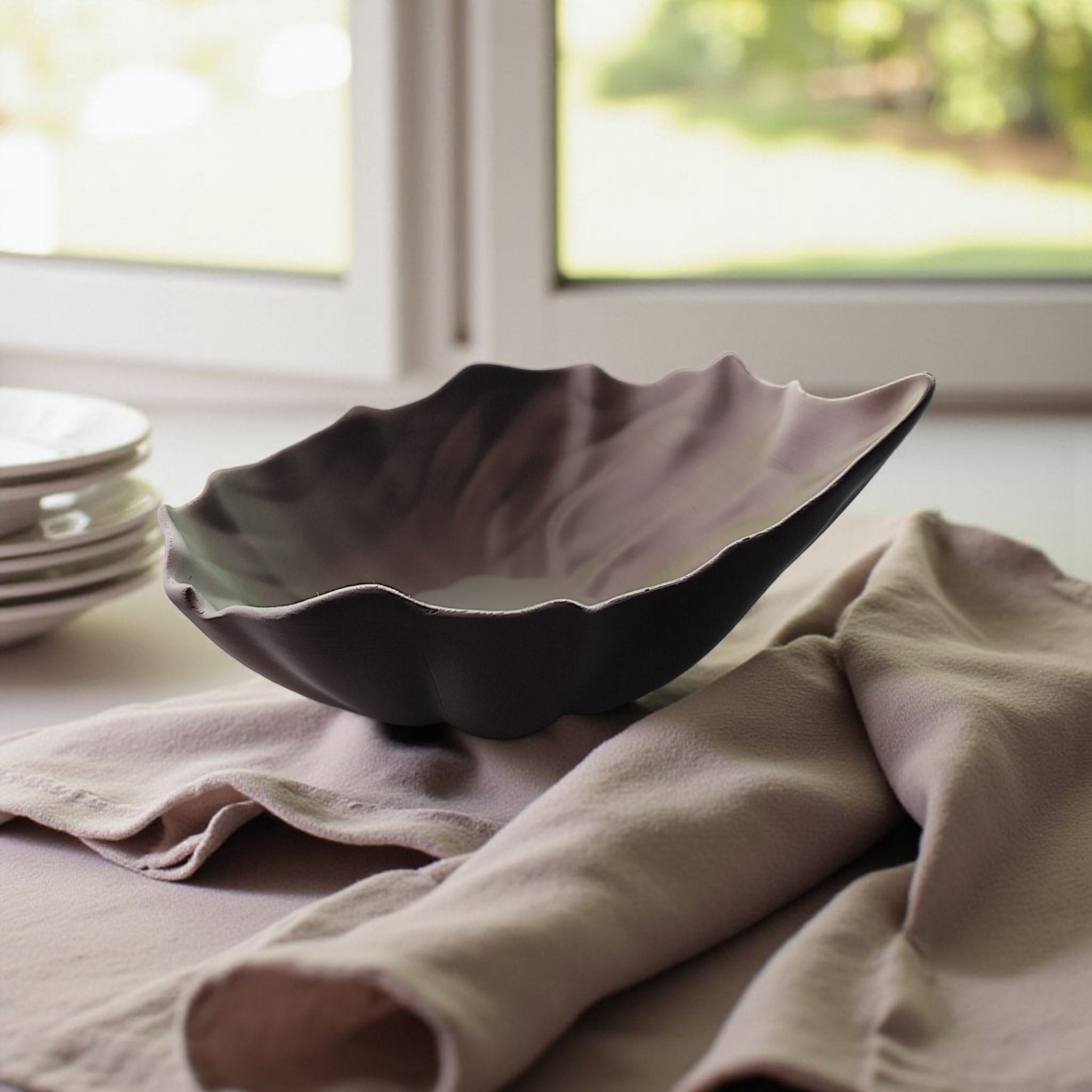 Decorative ceramic bowl on a table with a soft focus background