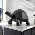 Geometric turtle sculpture on a kitchen counter
