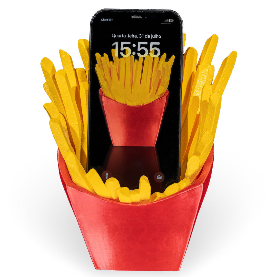 French Fry Phone Stand holding an iPhone on a colourful desk
