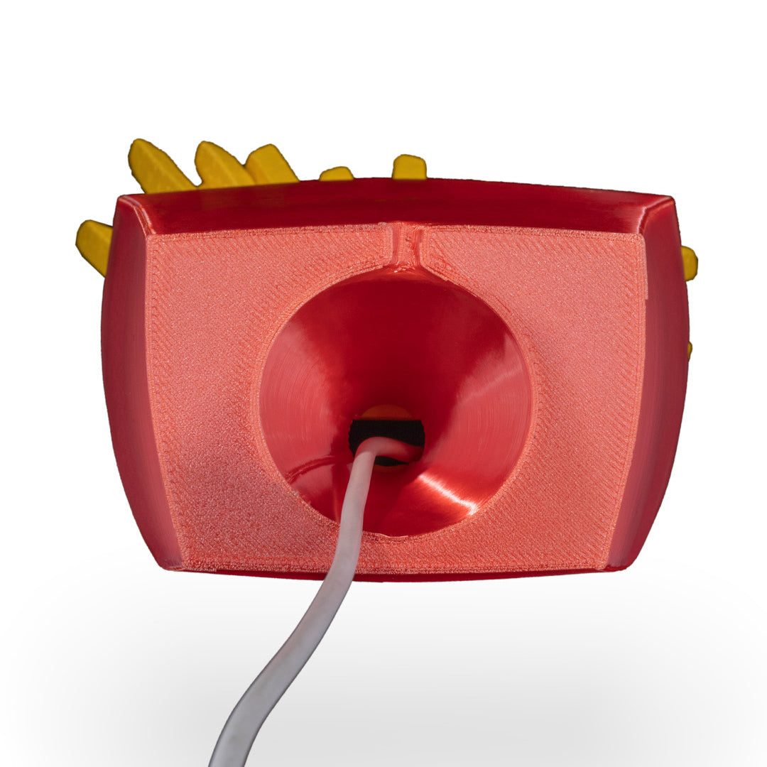 Overhead view of the funny French Fry Phone Stand with a smartphone