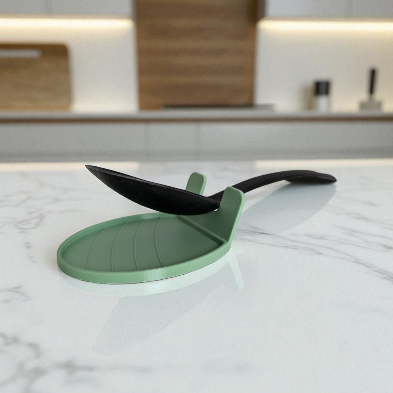 The CookSitter silicone spoon rest holding a wooden spoon on a kitchen counter.