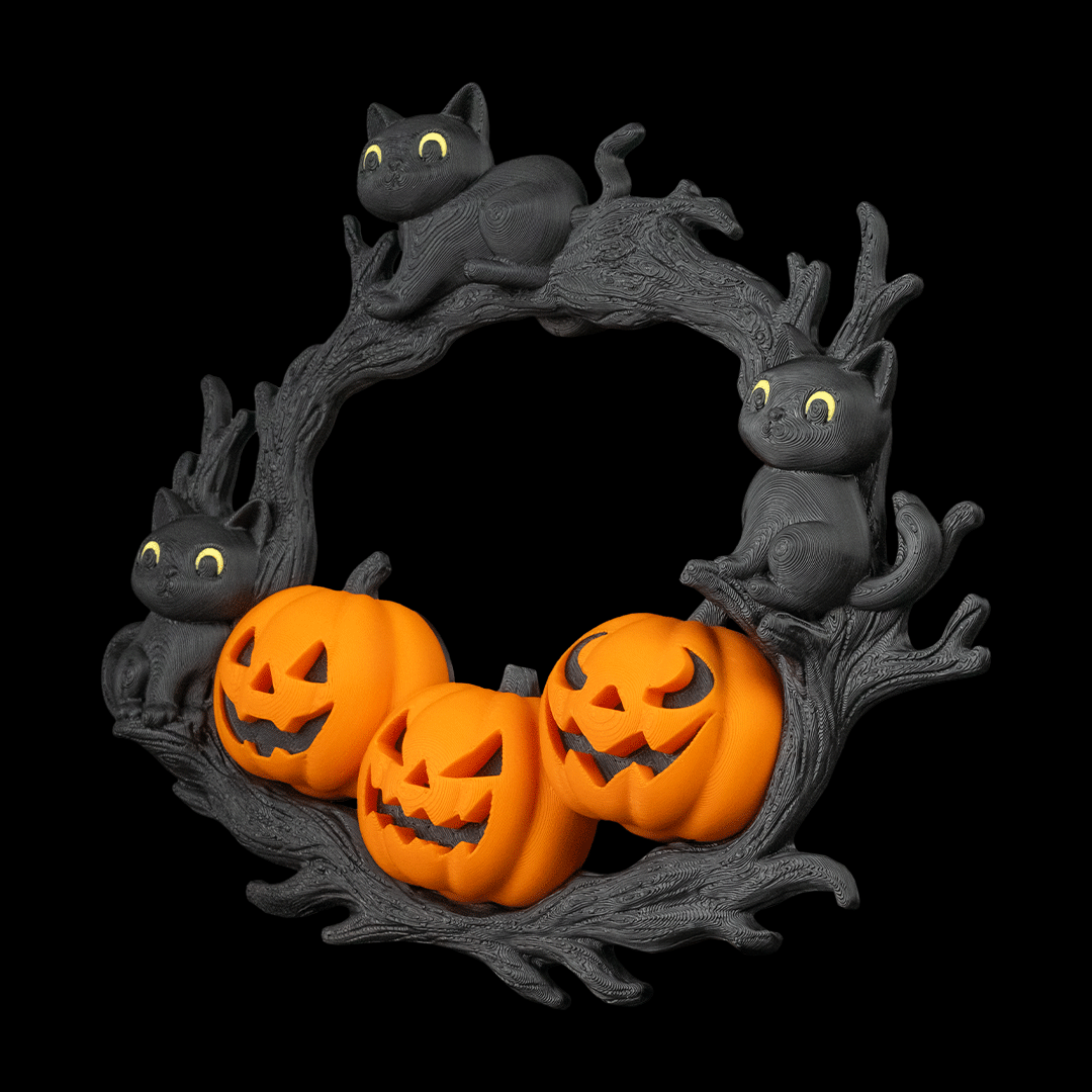 Halloween wreath with black cats and orange pumpkins on a black background
