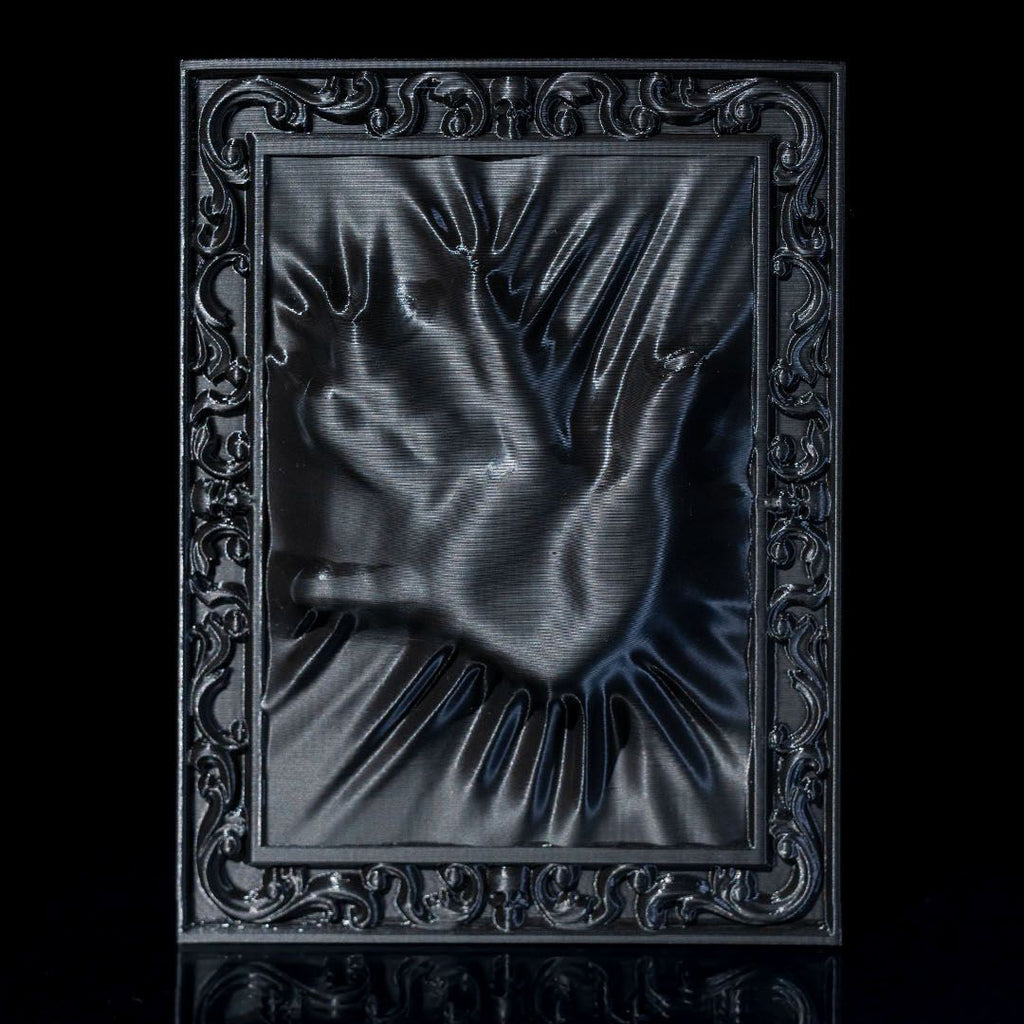 Decorative black frame with a textured design on a black background