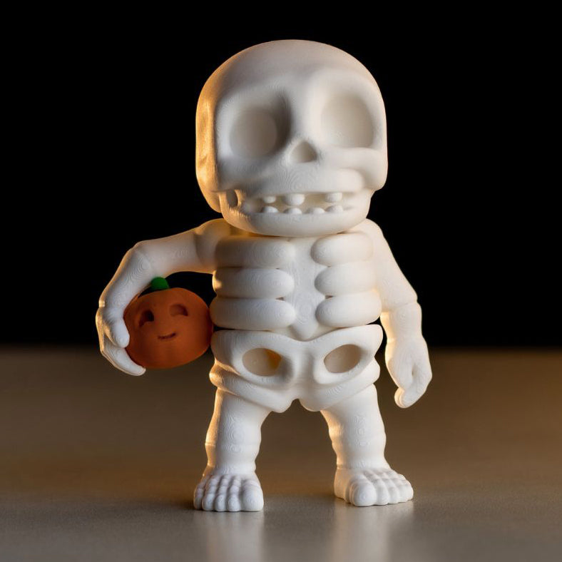 Flexi Skeleton with Pumpkin Keychain