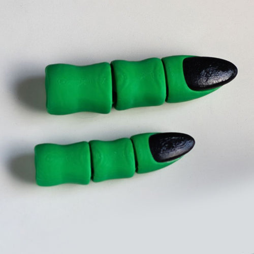 Two green and black finger-shaped objects on a white background