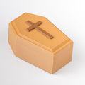 Orange coffin-shaped box with a cross on a white background