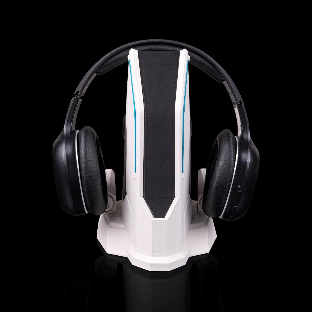 Sci-fi headset stand from the front with black headphones