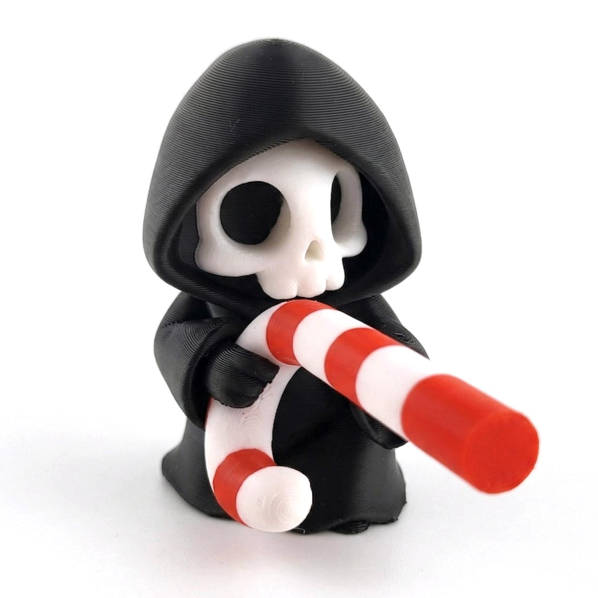 Candy Cane Carrier: a grim reaper holding a candy cane across its body