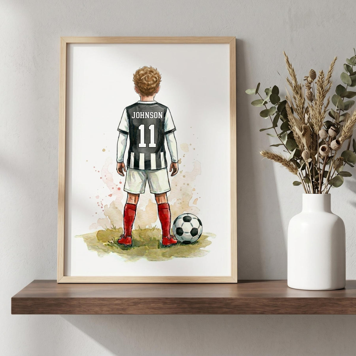 Personalised football print: a boy in a black and white striped kit, JOHNSON 11