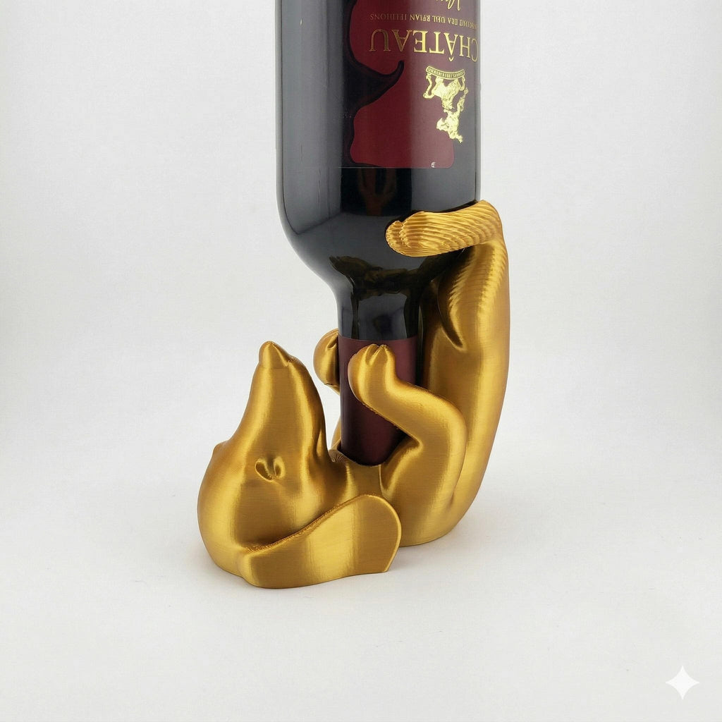Gold dachshund wine holder with a wine bottle