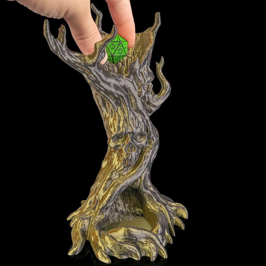 A hand dropping a green d20 into the Dreadwood dice tower