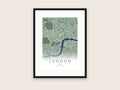 Personalised city map poster of London in a black frame: green streets and the blue Thames fading into the page above LONDON