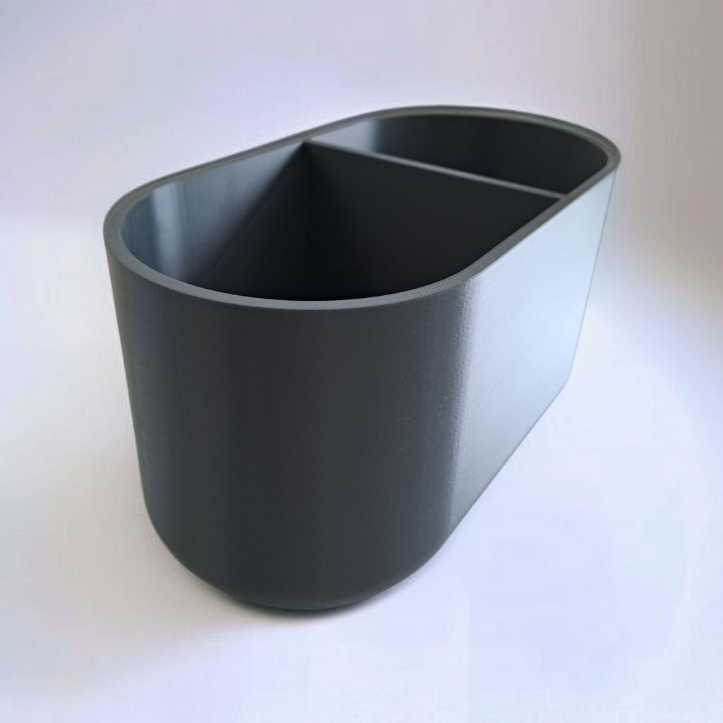 Gray dual-compartment container on a white background